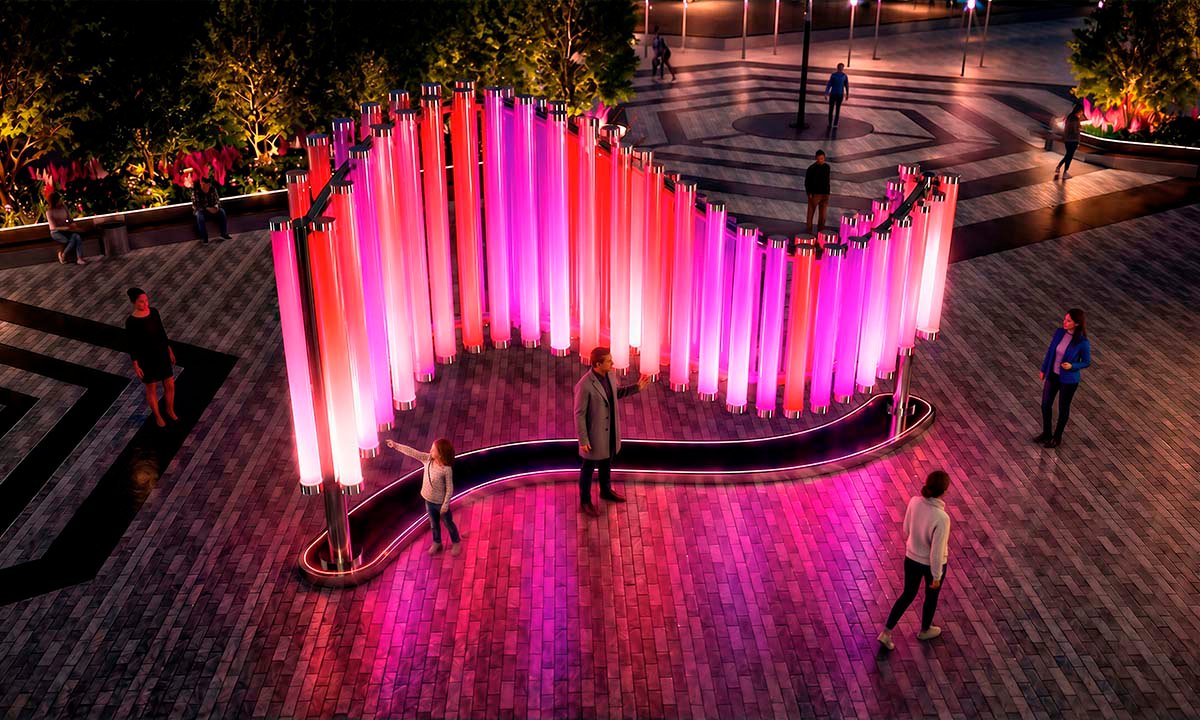 Interactive installation “Magic Streams” — a fluid, wave-like composition of vertical light cylinders shimmering in rich pink-red hues; the light gently pulses and shifts as people approach, creating the effect of a living stream of light within the evening urban plaza.